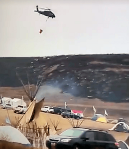 October 30, 2016: The morning after a grass fire was set near the Oceti Sakowin Camp during the night